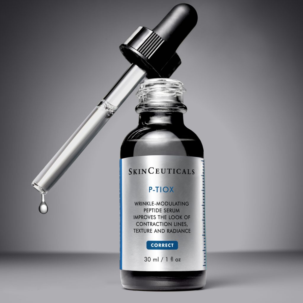  P-tiox wrinkle-modulating peptide serum by SkinCeuticals with dropper on a gray background.